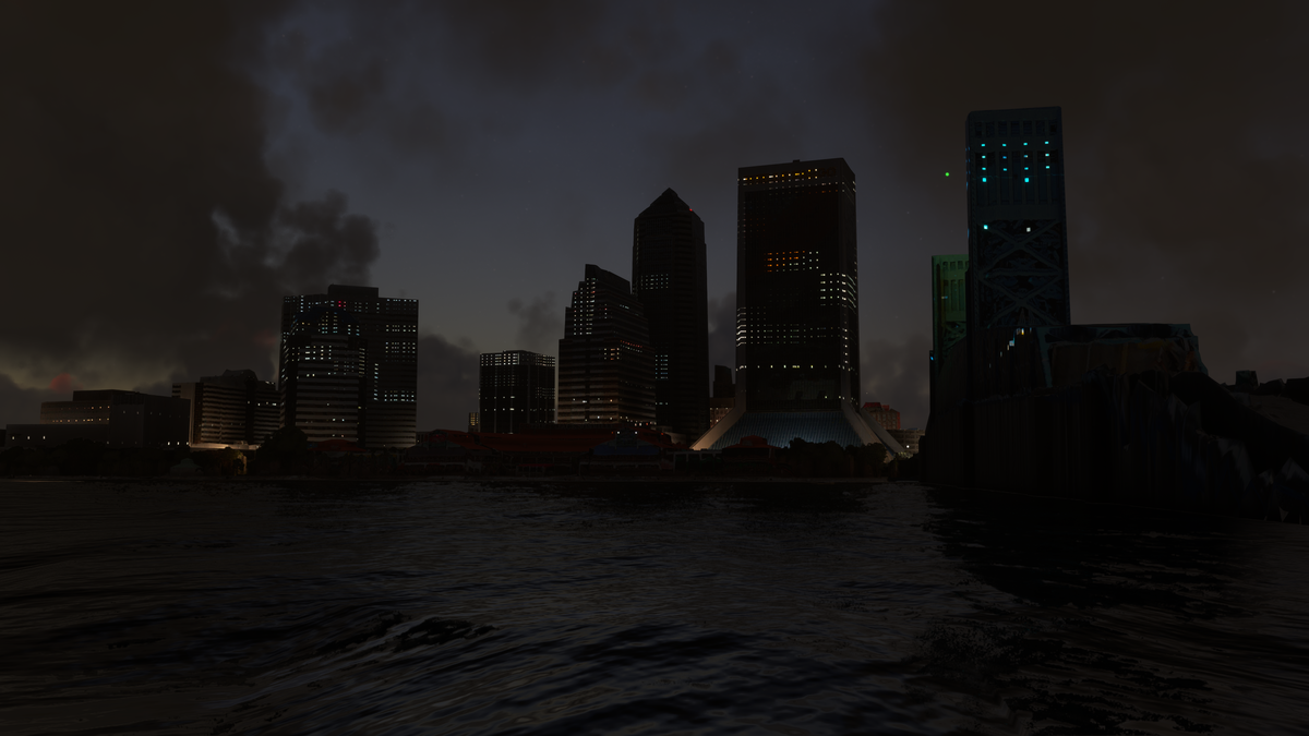Before: default MSFS scenery, Jacksonville riverfront skyline and blue-lit bridge at night