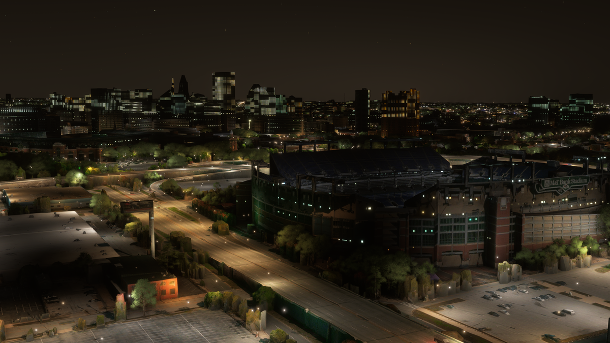 Before: default MSFS scenery, M&T Bank Stadium and the Baltimore skyline at night