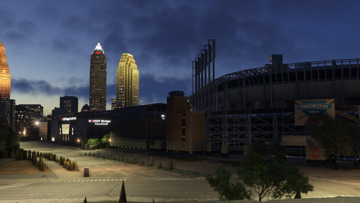Street-level nighttime view of Progressive Field, illuminated arena signs, and downtown towers in Cleveland, Ohio MSFS scenery.