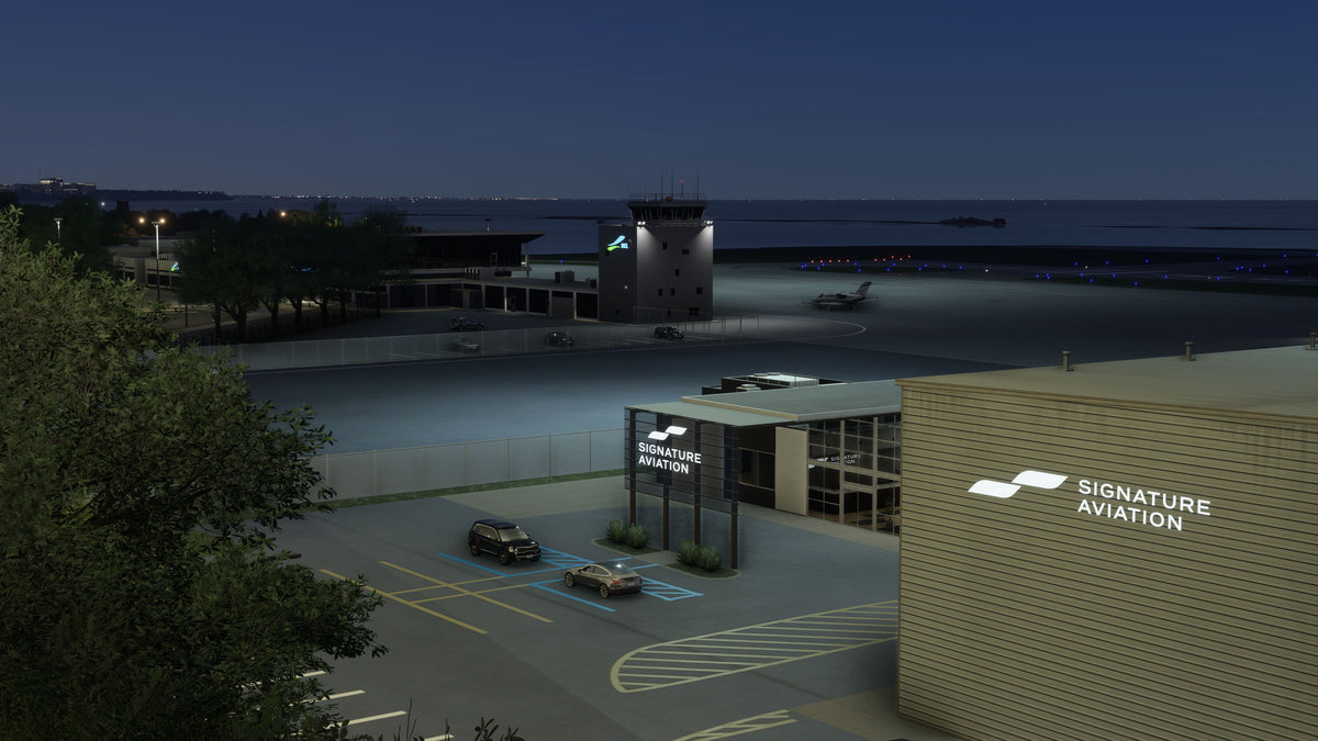 Signature Aviation buildings and KBKL control tower illuminated at night, with apron floodlights and taxiway lights in MSFS.